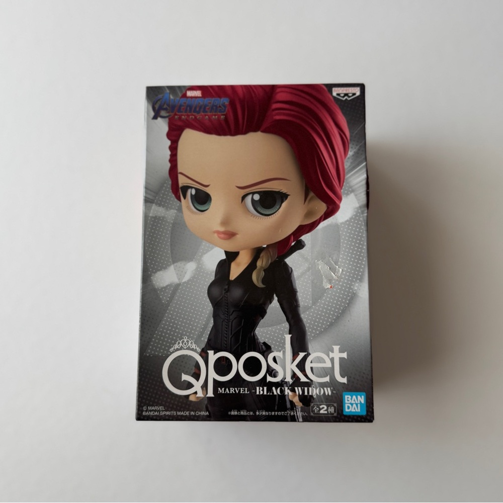 Marvel Qposket Figure with Red Hair and Black Outfit